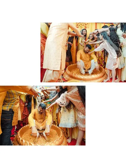 The groom getting his share of the Haldi fun, surrounded by his loved ones.