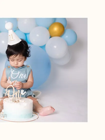 A moment of concentration. Even in the middle of a fun cake smash, there are these quiet, curious moments that I love to capture. It shows a whole different side of your little one's personality.