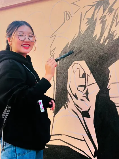 A student from St. Claret College trying her hand at painting. I love it when my projects inspire others to get creative.