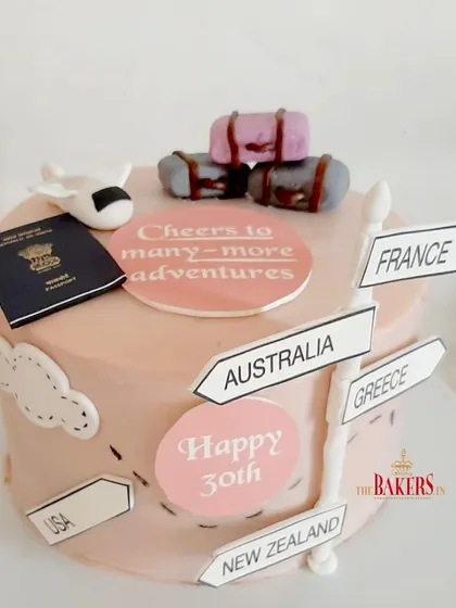 "When in doubt, travel." I loved making this travel-themed cake for a 30th birthday. It features a passport, luggage, and signposts to favorite destinations, perfect for a globetrotter.