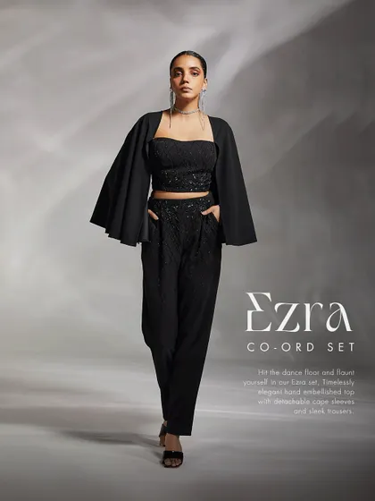 Hit the dance floor in our Ezra set, offering a timelessly elegant hand-embellished top and sleek trousers.
