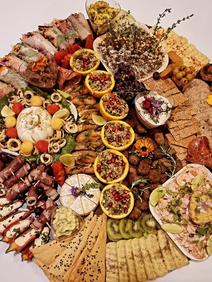 Seafood and meats share this round platter, which we customised for a client who wanted a little of both.