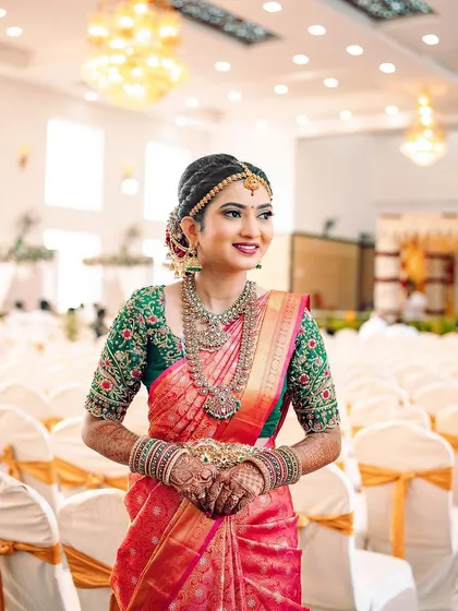 A full shot of Rakshita's second look, ready for the next phase of her wedding ceremony.