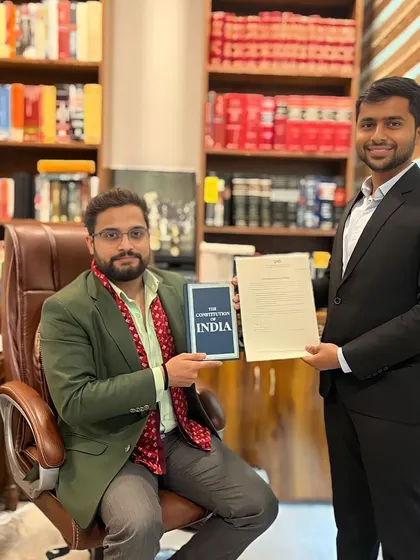 Recognizing one of our January law interns for their hard work and dedication. I gift a copy of the Constitution of India to interns to remind them of the foundation of our legal system.