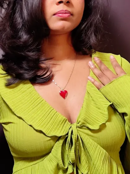 A close-up of this beautiful red heart pendant. A statement necklace can be a great way to add a pop of color and personality to a simple outfit.