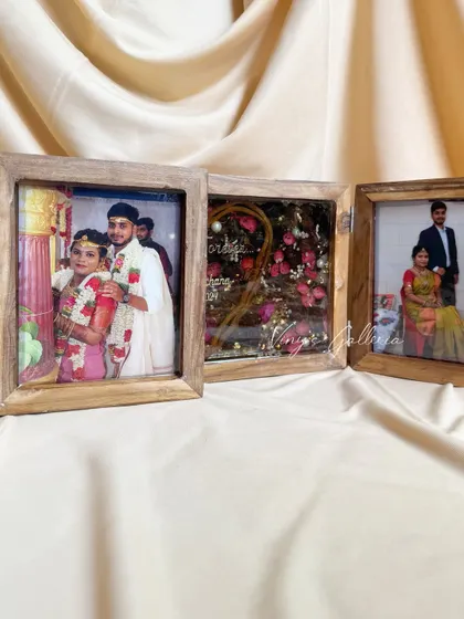 A full view of the folding triptych frame, showing how the three panels work together to create a cohesive and beautiful display of a couple's wedding story.