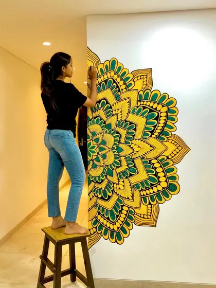 A fresh and vibrant corner mandala in shades of yellow and green. This piece brings so much energy to the hallway.