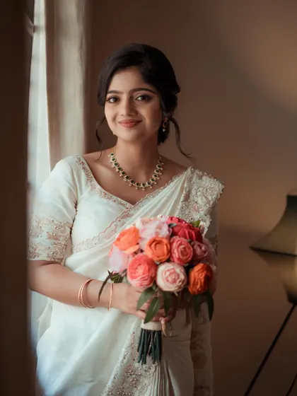 My bride Anju, transformed into a real-life Barbie for her church wedding. We created a dewy, soft glam look that made her glow from within.