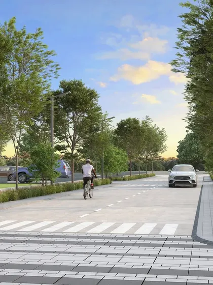 This render for the Tricone City extension in Indore illustrates our streetscape design, featuring dedicated cycling lanes, pedestrian walkways, and green buffers to create safe and pleasant mobility corridors.