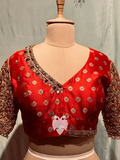 A frontal view of the Kanjeevaram and Banarasi fusion blouse.