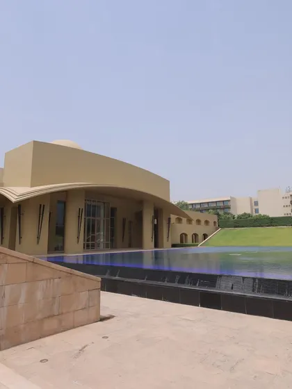 Another shot of the beautiful resort venue, showing the seamless blend of modern architecture and green lawns.