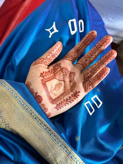 A close-up of my henna design, with some simple white doodles to make it stand out.