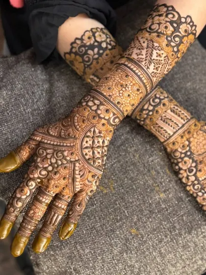 This is a detailed view of my intricate bridal henna work. Each design is unique, combining traditional patterns like paisleys and mandalas with fine-line fillers to create a stunning, full-coverage look for your special day.