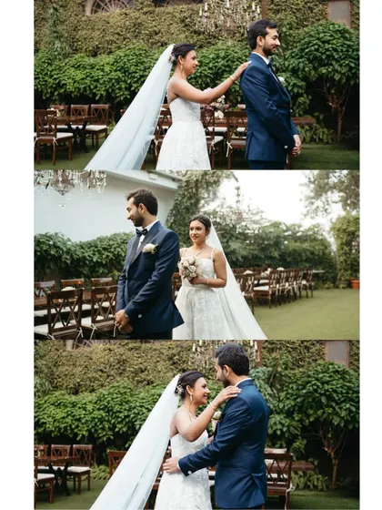 A different perspective of the first look, showing the bride gently touching the groom's shoulder to reveal herself. A beautiful start to their wedding day story.