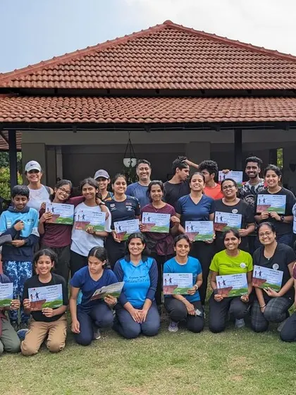 The entire family trek group posing with their well-earned completion certificates.