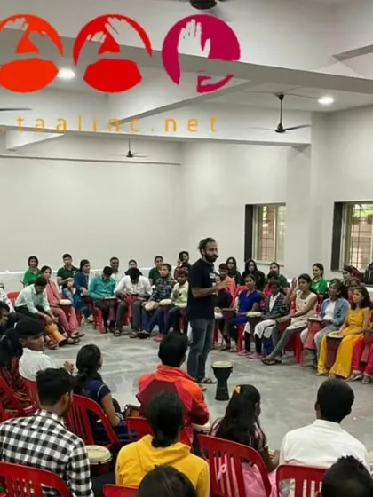 A wide shot of the drum circle for visually impaired persons. It's a powerful reminder that music and rhythm are felt, not just heard or seen, and can connect us on a deeply human level.
