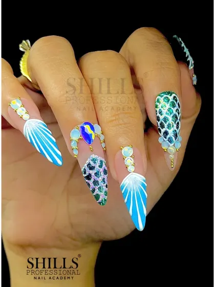 We believe nails are a form of art. This mermaid-inspired set shows our love for detailed, imaginative designs, combining sculpted 3D scales, hand-placed jewels, and delicate wing patterns for a truly magical look.