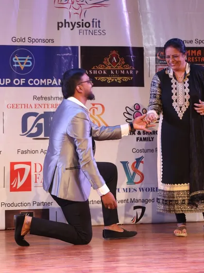 A fun, spontaneous moment on stage with an audience member.