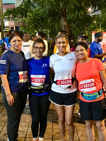 The ladies of our running crew, ready to take on the Mumbai Half Marathon at the start line.