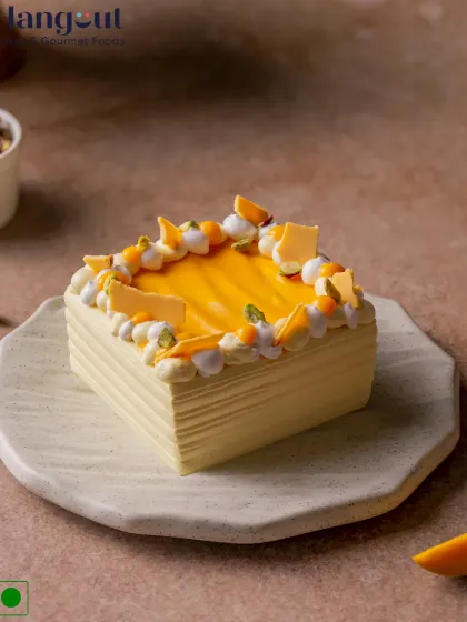 This is my Mango No Added Sugar Bento Cake. It's not only gluten-free but is sweetened naturally with real Alphonso mangoes, so you get a truly clean, fruity flavour in every bite. It's a perfect guilt-free treat for one or two people.