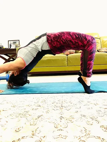 This is the bridge pose, another excellent yoga asana for strengthening the back and glutes. Consistency with yoga has made a huge difference in my strength and flexibility over the last few years.