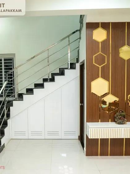 A duplicate image of the stylish entryway panel and under-stair storage solution.
