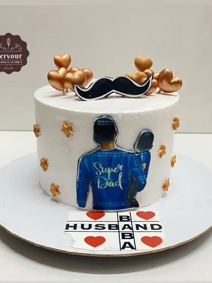 A heartfelt cake for a "Super Dad" and husband. The design includes an edible photo and a fun Scrabble-tile message, making it a wonderful way to celebrate a family man.