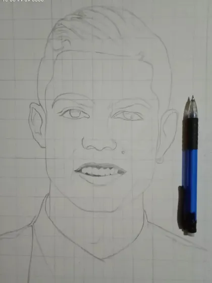 The beginning of my Cristiano Ronaldo portrait. This image shows the basic outline sketch, which is the first and most crucial step in achieving a realistic likeness.