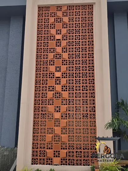 A large-scale jali wall feature we built as part of a building's facade. The intricate pattern, with its protruding elements, creates a stunning textural surface that is both a traditional and modern architectural statement.