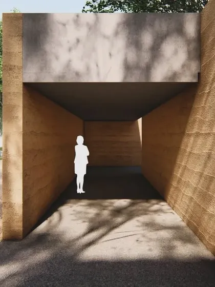 A rendering of an entranceway in the rammed earth retreat, where the material's texture and color create a space that feels both ancient and modern.