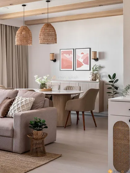 Another angle of this serene living and dining room, highlighting the comfortable seating and the connection between the two zones. The artwork adds a subtle pop of color.