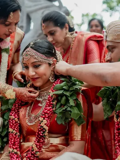 A moment of quiet connection amidst the grandeur of The Tamarind Tree. We love using the venue's stunning architecture to frame our couples, creating a story of romance and tradition.