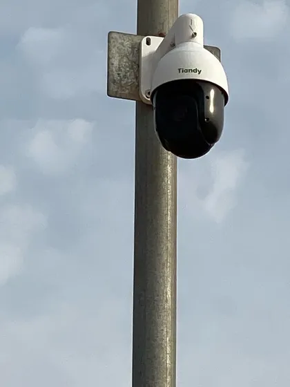 A Tiandy PTZ camera mounted on a pole in Abdally. This is part of a 20-camera installation project for a large property.