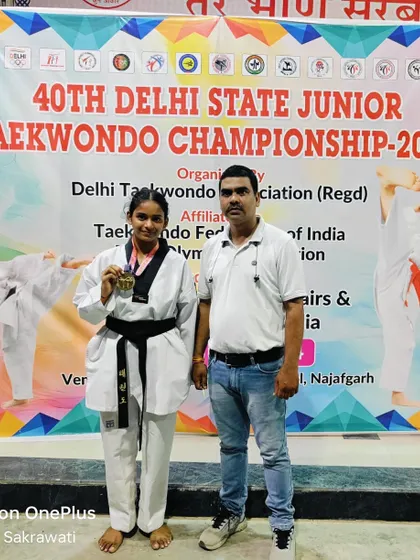 With Vanshika Singhal after she won gold at the 40th Delhi State Junior Taekwondo Championship 2024. This victory qualified her for the Junior Nationals in Aurangabad.