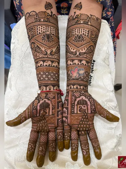 A royal design, perfect for a bridesmaid, adorned with peacocks, elephants, and blooming lotuses for a look that is festive and grand.