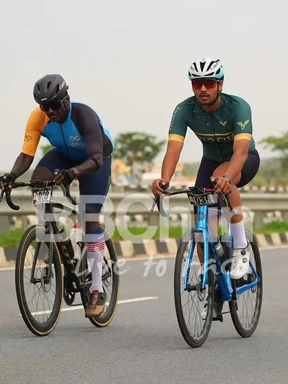 Two masters riders, working together in a breakaway.