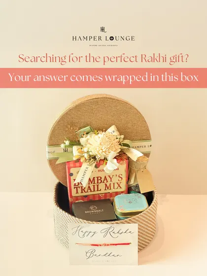 Searching for the perfect Rakhi gift? This round, textured box is filled with artisanal snacks like Bombay's Trail Mix, premium nuts, and other surprises that scream sibling love.