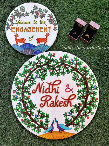 The complete set for my engagement, including the welcome sign and the main name board with our rings. I designed them to be reusable for future events or as home decor.