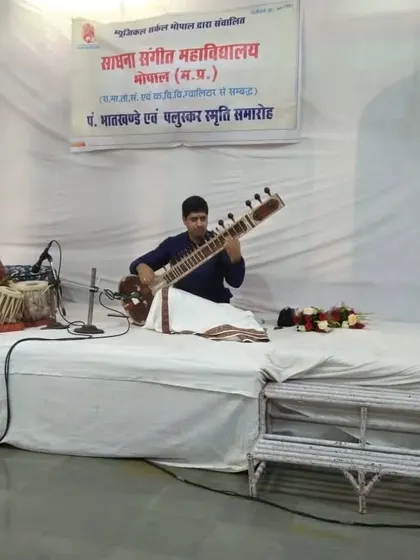 A moment of interaction with the tabla artist during our performance.