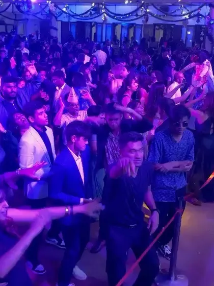Another angle of the packed dance floor at the Catholic Club. Every person in the room was part of the celebration.