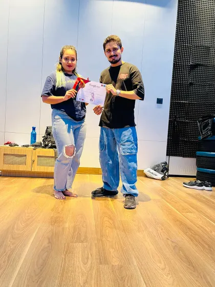 Students of all ages receiving their achievement certificates. My programs are structured to provide a clear path of progression for every dancer.