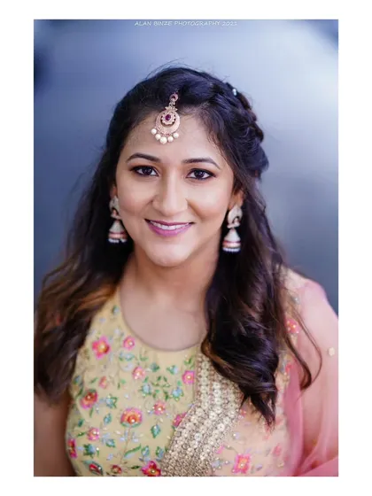 A beautiful bridal portrait. The soft lighting and her gentle smile perfectly capture the happy glow of a bride-to-be.