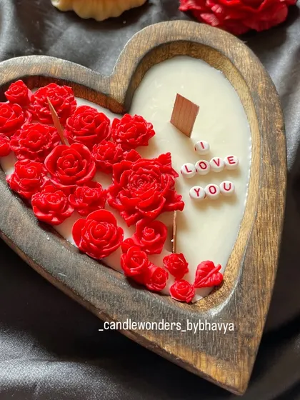A finished "I Love You" wooden heart bowl candle, a beautiful and personal gift for a loved one.