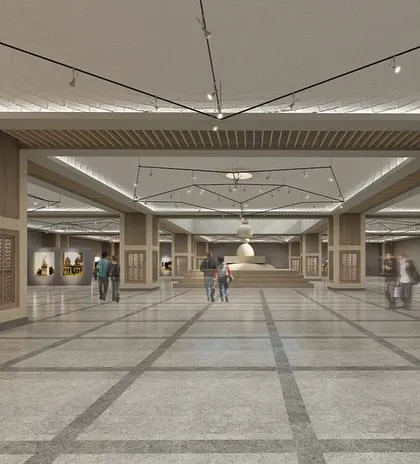 An interior view of the main gallery hall. The design simulates the sensory experience of the monuments through its scale, geometric discipline, and carefully controlled lighting, creating an immersive atmosphere for visitors.