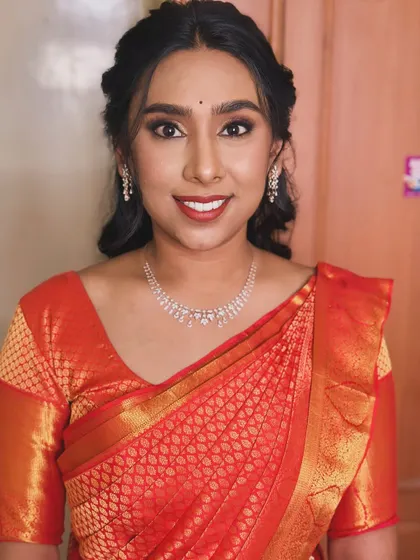 A happy smile from Sirisha on her wedding day. I worked to create a smooth base for her textured skin, ensuring a confident and beautiful result.