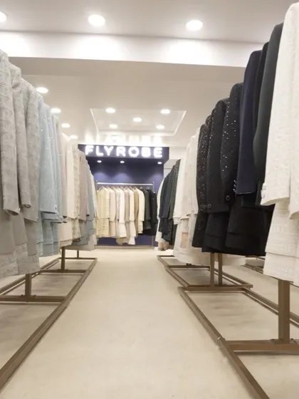 An aisle view between our racks, showcasing the depth and variety of our collection. There's something here for everyone.