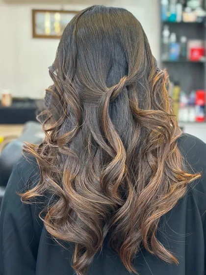 Another view of these beautiful brown curls, showing the dimension and shine.