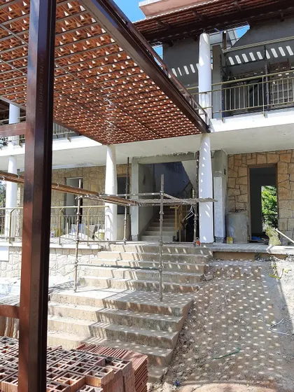 A 'jali' (lattice) porch at our upcoming guest facility in Chikmagalur creates a stunning display of light and shade. The mesmerizing patterns shift throughout the day, changing the quality and feel of the space.