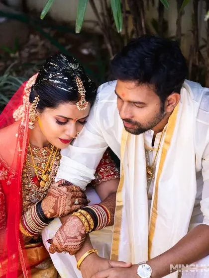 A duplicate of 296, this tender moment between the couple highlights the beauty of the bride's stained hands.