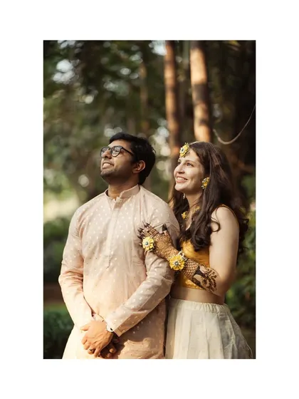 A beautiful portrait of Amanda and Ankur during their mehendi ceremony. The soft natural light and their coordinated outfits create a serene and joyful image.